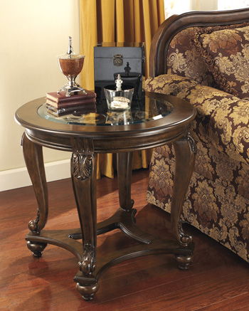 Norcastle - Dark Brown - Round End Table Cleveland Home Outlet (OH) - Furniture Store in Middleburg Heights Serving Cleveland, Strongsville, and Online